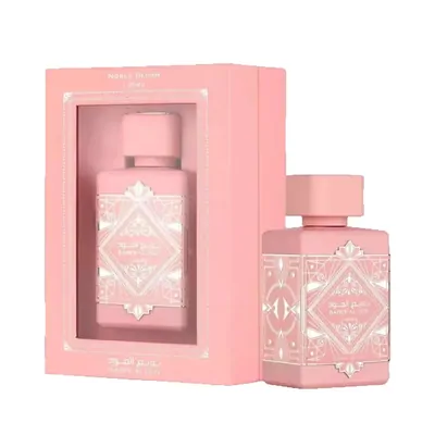 Pink perfume bottle with its presentation box